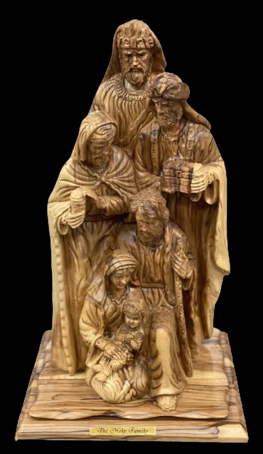 Tall olive wood carving of the Holy Family arranged in tiers on a carved base