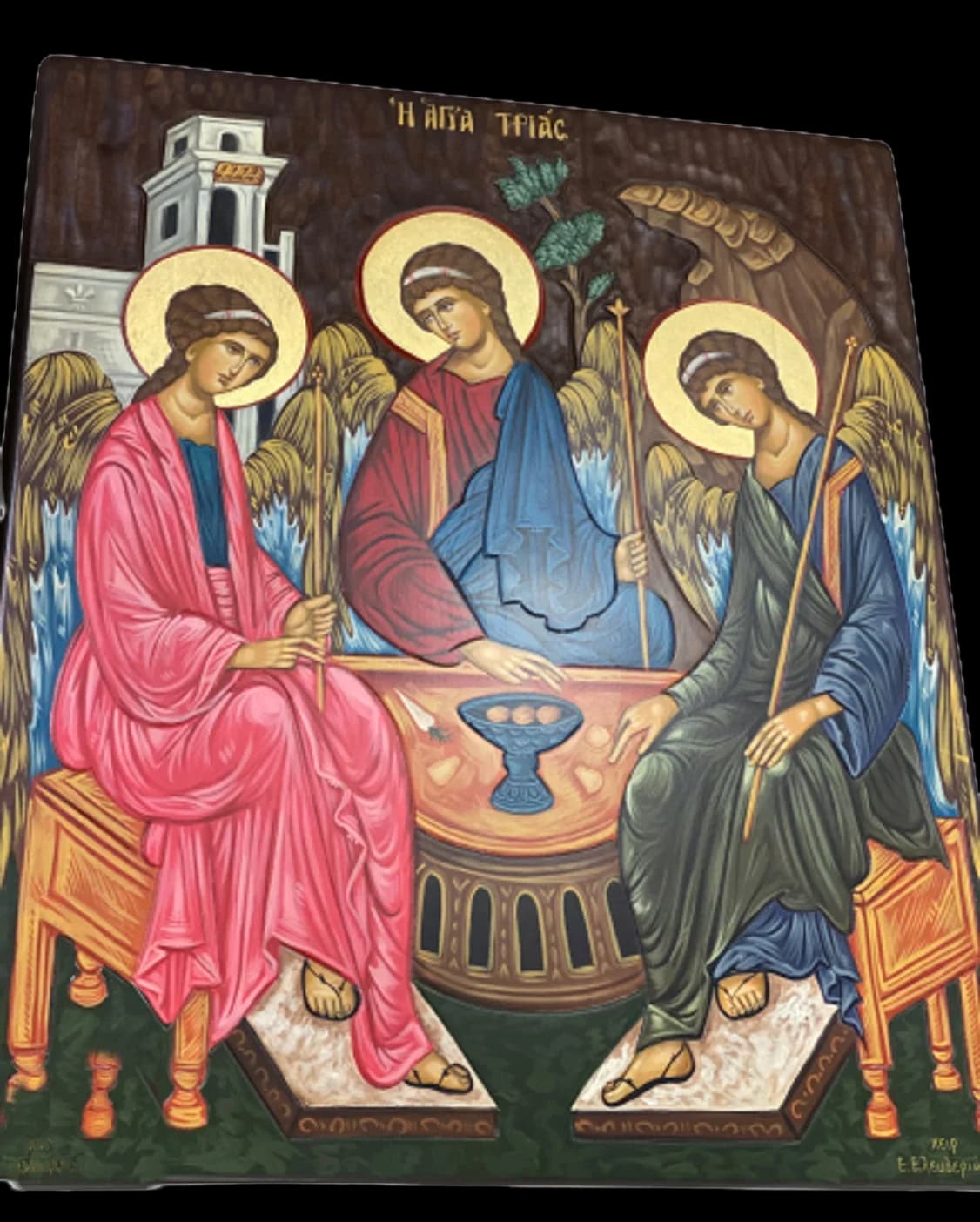 Hand-painted icon of the Holy Trinity: three angels seated at a table