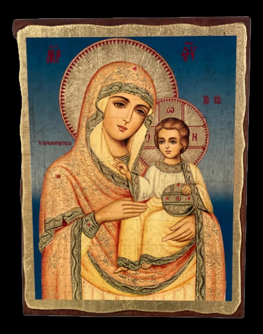 Small icon of the Virgin and Child on a panel with gilded, aged edges
