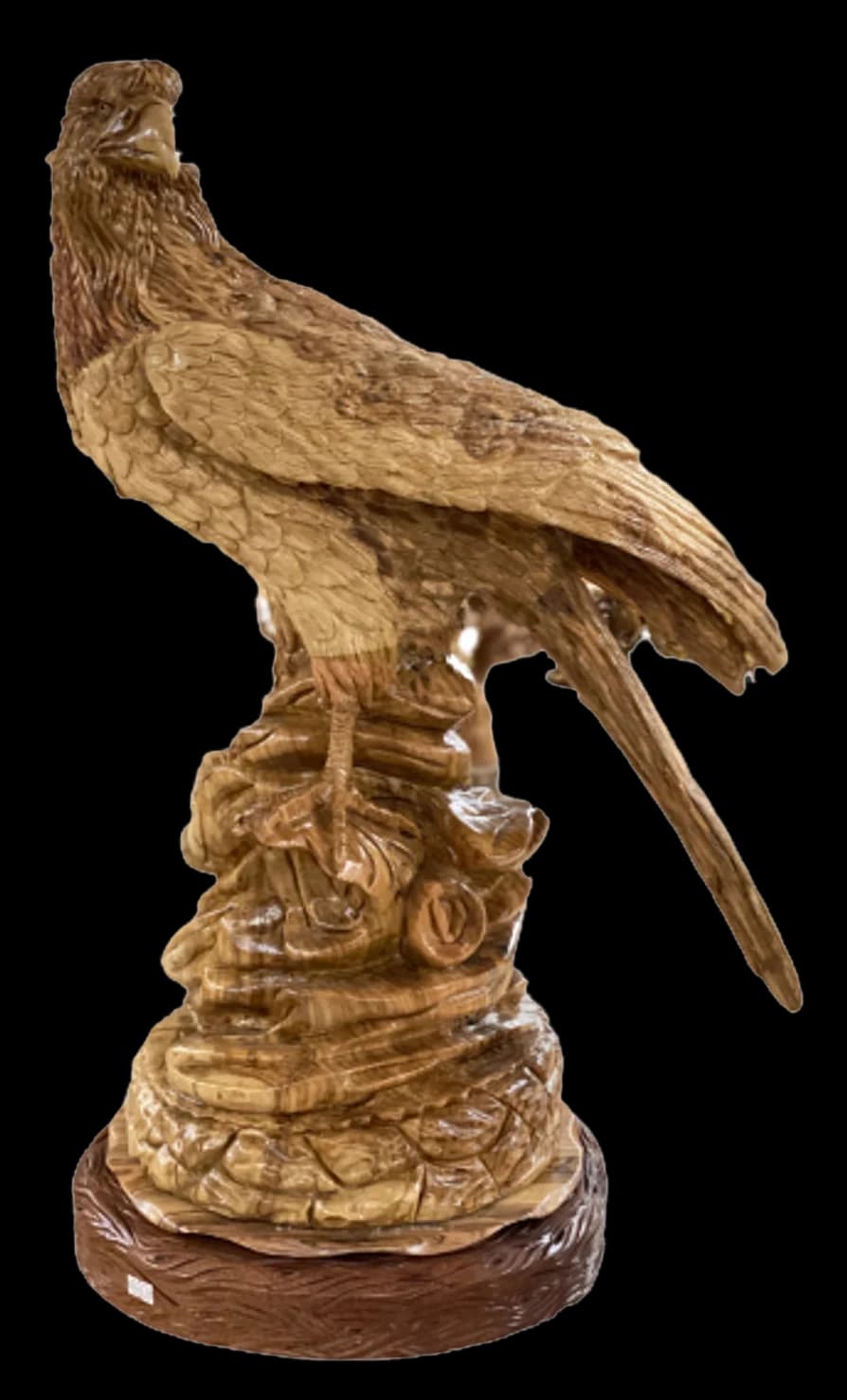 Large olive wood carving of an eagle perched on a carved rock